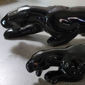 2 black panther statues